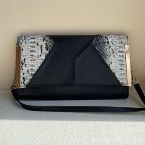 Black and gray snakeskin bag with gold hardware